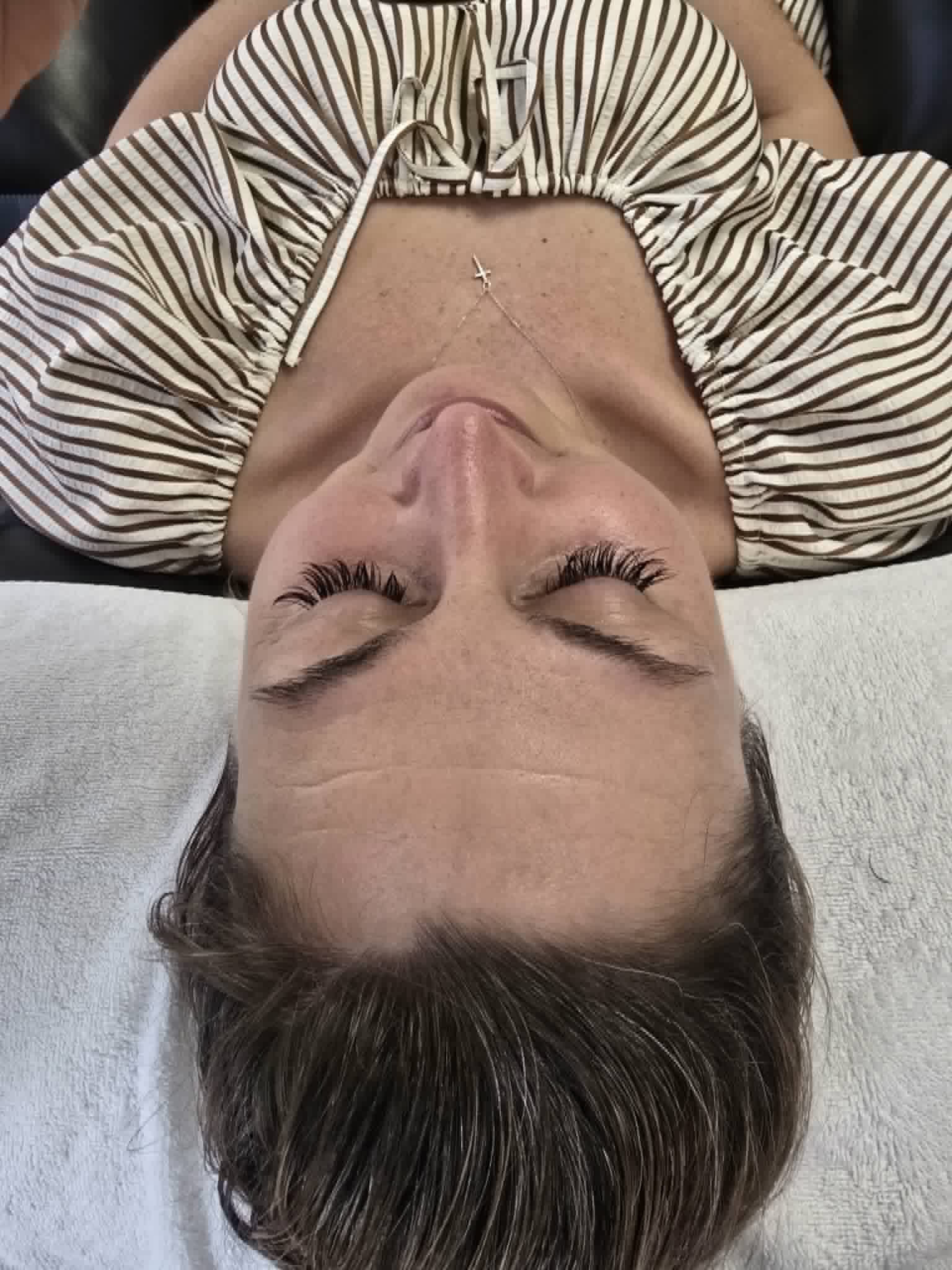 Brittany's lash extensions close-up by Tiffany at Glam Spa